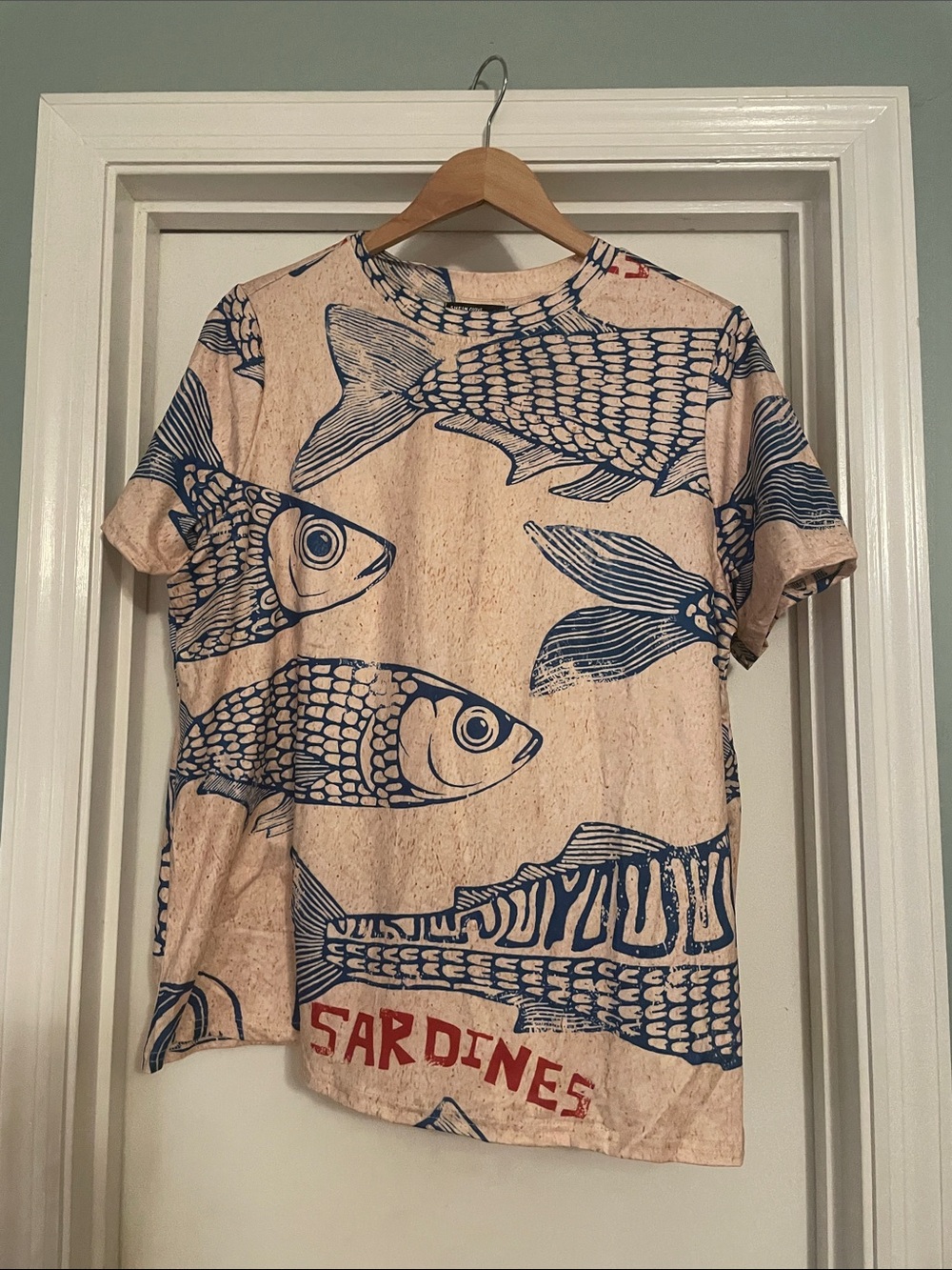 SHEIN Beige Tee with Blue Sardine Graphic
